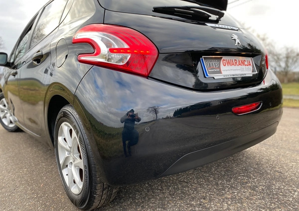 Peugeot 208 cena 26890 przebieg: 148463, rok produkcji 2014 z Strzyżów małe 781